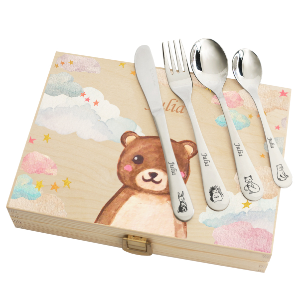 Cutlery engraved with clouds and animals